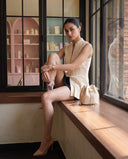 Elise Ivory White Pintuck Peplum Top